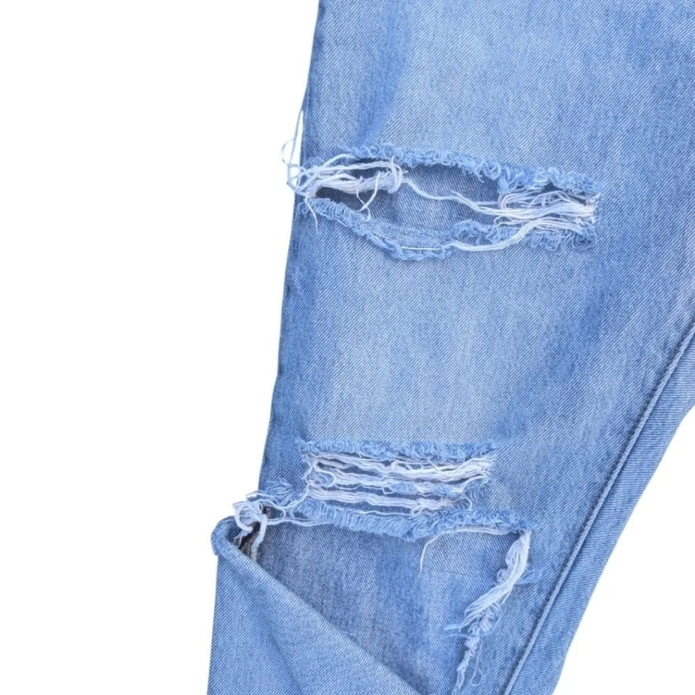 Levi's 501 button fly Thrashed busted knee light wash denim jeans W29 L28